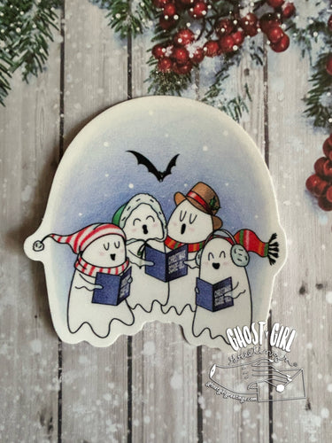 Holiday themed stickers with ghosts caroling. Each are wearing winter accessories like hats, earmuffs or scarves.
